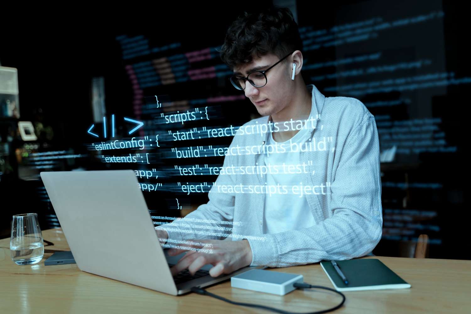 programming-background-with-person-working-with-codes-computer